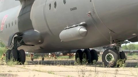 Lower fuselage of An-12BK (Cube) military transport aircraft after maintenance. Stock Footage 208349547