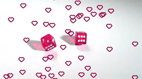 Lower-left roll sending pink dice bumping, settling while hearts drifting, Stock Footage 328347695