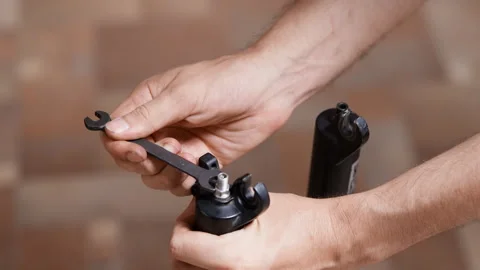 Lower leg fork service, bicycle suspension fork Stock Footage 280478720