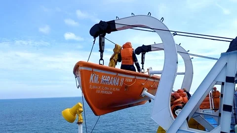 Lower the lifeboat on the ship Stock Footage 219659698