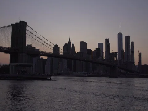 Lower Manhattan and Brooklyn Bridge at sunset Video stock 80317687