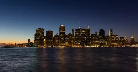 Lower Manhattan Financial District between sunset, dusk and nightfall. New York Stock Footage 67002962