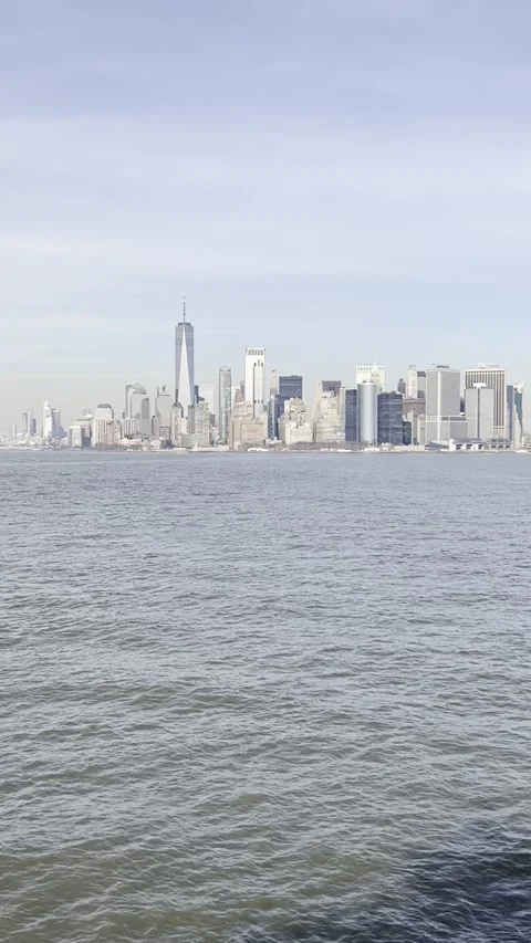 Lower Manhattan Skyline with One World Trade Center Vertical Ferry View Stock Footage 328158483
