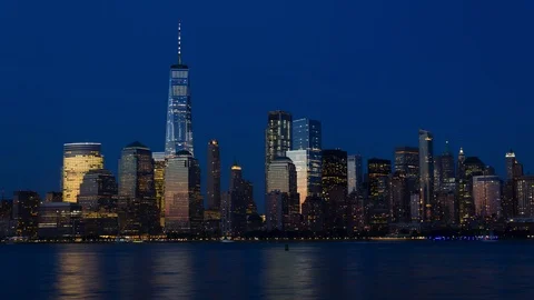 Lower Manhattan Skyline Reflected at Blue Hour Vídeo Stock 90387515