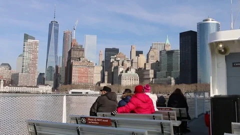 Lower Manhattan skyline seen from ferry from Statue of Liberty Stock Footage 81006877