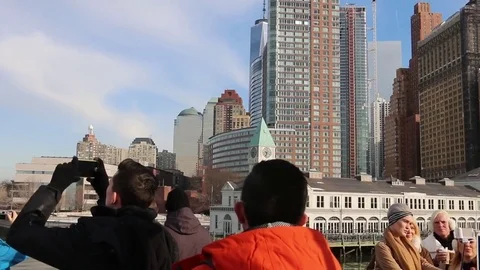 Lower Manhattan skyline seen from ferry to Statue of Liberty - 2 versions Stock Footage 81615482