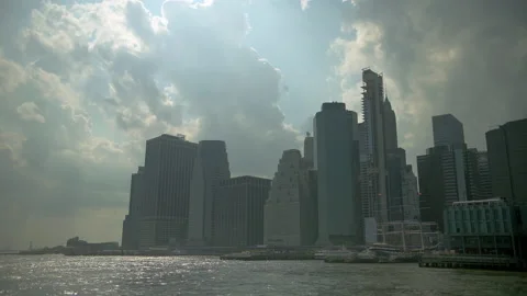 Lower Manhattan Skyline Slow-Mo from East River Afternoon August 2021 Video stock 158764802