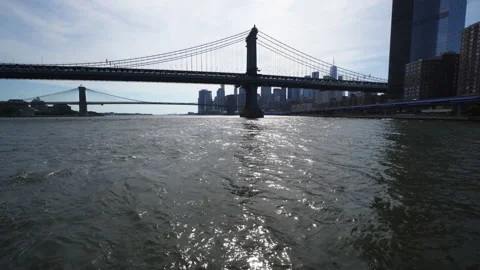 Lower Manhattan skyscraper stands beyond the East River Stock-Footage 143813384