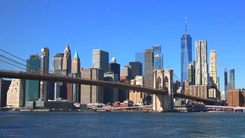 Lower Manhattan skyscraper stands beyond the East River NYC Stock-Footage 170095916