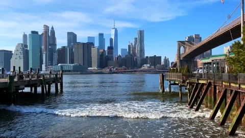 Lower Manhattan viewd from Brooklyn Bridge Park on a clear winter day Stock Footage 102810183