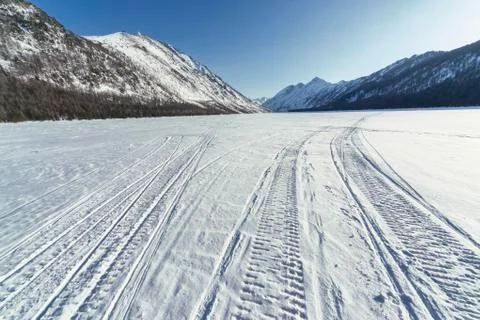 Lower Multinsky lake under snow, a sunny day Stock Photos
