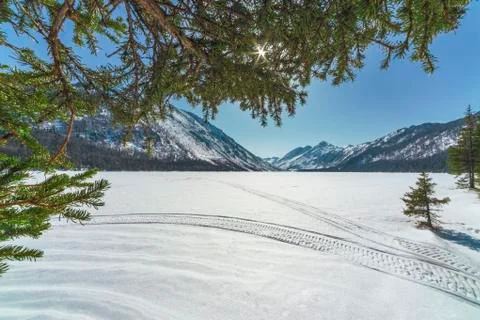 Lower Multinsky lake under snow, a sunny day Stock Photos