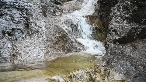 The lower part of a rocky waterfall (slow motion) Stock Footage 260847066