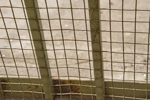 Lower portion of iron gate sealed with net Stock Photos