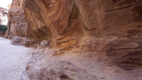 The lower section of the ancient eroded Nabataean camel caravan relief  Stock Photos