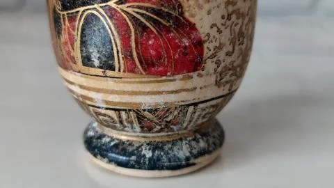 Lower section of decorative vintage ceramic vase with painted ornamental pa.. Stock Photos