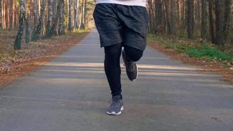 Lower section of jogging man Stock-Footage 102830583