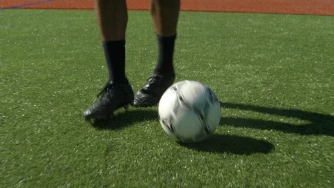 Lower section of male demonstrating soccer skills. Stock Footage 88048664