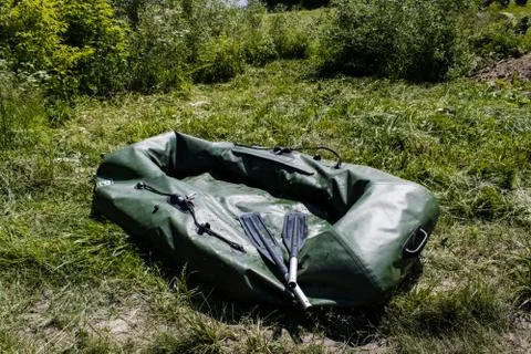 Lowered inflatable boat Stock Photos