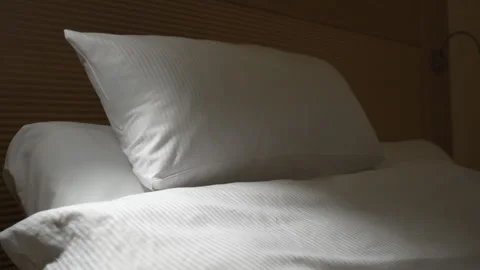 Lowering and raising the head of adjustable bed Stock Footage 124752380