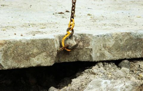 Lowering the concrete slab and creating duct and protection of the water pipe Stock Photos