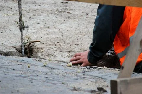 Lowering the concrete slab and creating duct protection of the water pipes fr Stock Photos