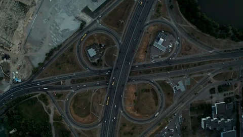 Lowering down above the road junction smoothly turning to the right Stock Footage 111873134