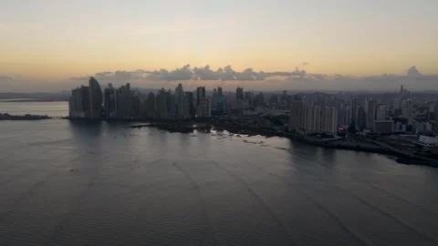 Lowering Drone Aerial View of Panama City Waterfront Skyline at Sunset Video stock 334339714