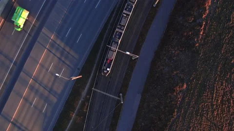 Lowering over a passing tram. Busy traffic. The bustle of the city. Stock Footage 165879931