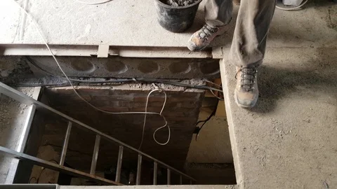 Lowering of plastic bucket with mortar Stock Footage 104772808