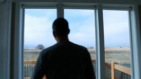 Lowering the window shades in a house Stock Footage 32907104