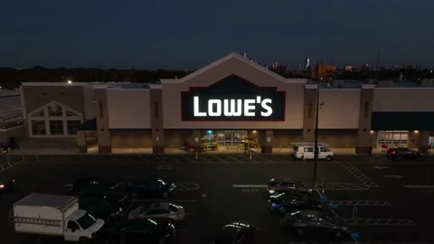 Lowe's big box hardware retail store at night. Wide aerial approach. Stock Footage 220269559