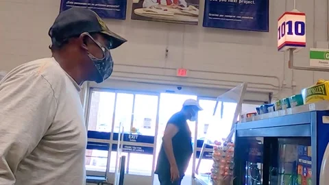 Lowes Home Improvement Store customers wearing face masks at checkout Stock Footage 144006992