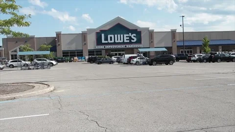 Lowes home improvement warehouse hardware storefront with logo in summer, wide Stock Footage 249097809