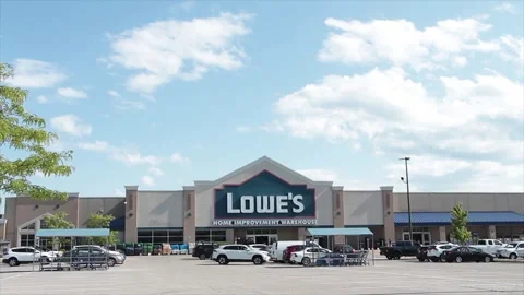 Lowes home improvement warehouse hardware storefront with logo in summer, wide Stock Footage 249097918