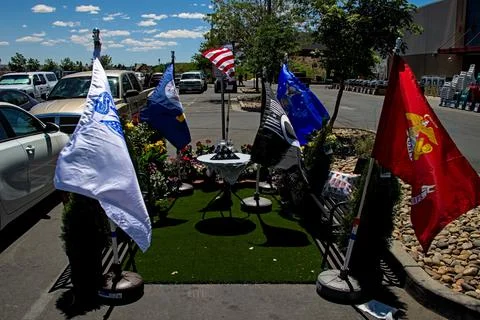 Lowes memorial day flags setup in parking space. Stock Photos