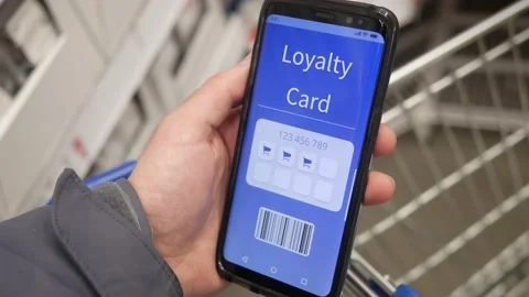 Loyalty Card on a Smartphone Screen at the Store Video stock 144035335
