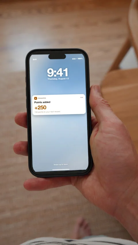 Loyalty points earned alert on a phone, vertical, building customer loyalty Video stock 344913365