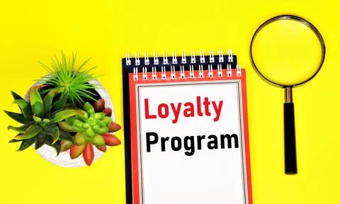 Loyalty program. Text label in the planning notebook. Fotos de archivo
