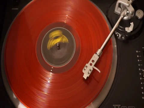 LP colored vinyl disc plays on turntables Stock Footage 124330776