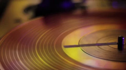 LP rotating disc in yellow and gold tones. Stock Footage 40013088