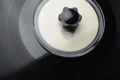 LP vinyl record disk with plastic cleaning or washing clamp Stock Photos