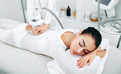 Lpg back massage accelerates the elimination of body fat. The body will be sl Stock Photos