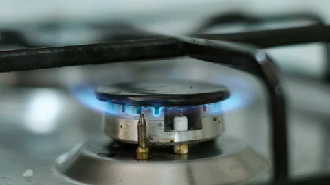 Lpg propane gas kitchen stove closeup while burning,not renewable energy wastage Stock Footage 161357488