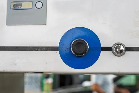 LPG refueling button at a self-service gas station. Stock Photos
