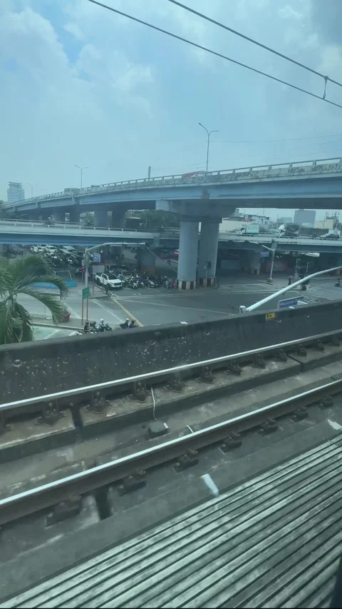 LRT 2 Train Window View Nagtahan Flyover Interchange Manila Traffic 4K 60fps Stock-Footage 338185533
