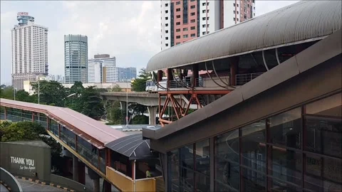 The LRT light rail transit train is moving out of the station Stock Footage 326194640