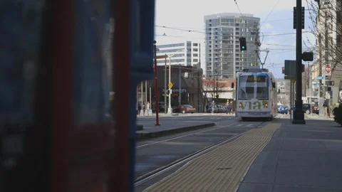 LRT Pulling Away in Downtown Seattle Stock Footage 115502089