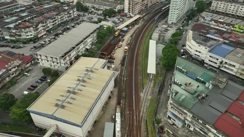 LRT Train Approaching Station in Urban Railway Network Видео 337332127