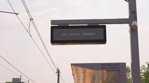 LRV Testing Underway sign at new three-car light rail for vehicle LRV along.. Stock Footage 244016930